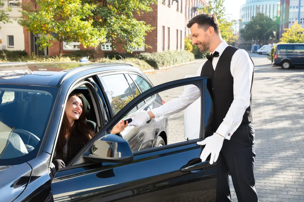 Valet_Taking_keys_women.webp